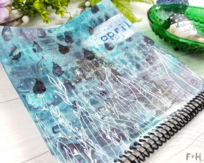 blue mixed media calendar on a white desk